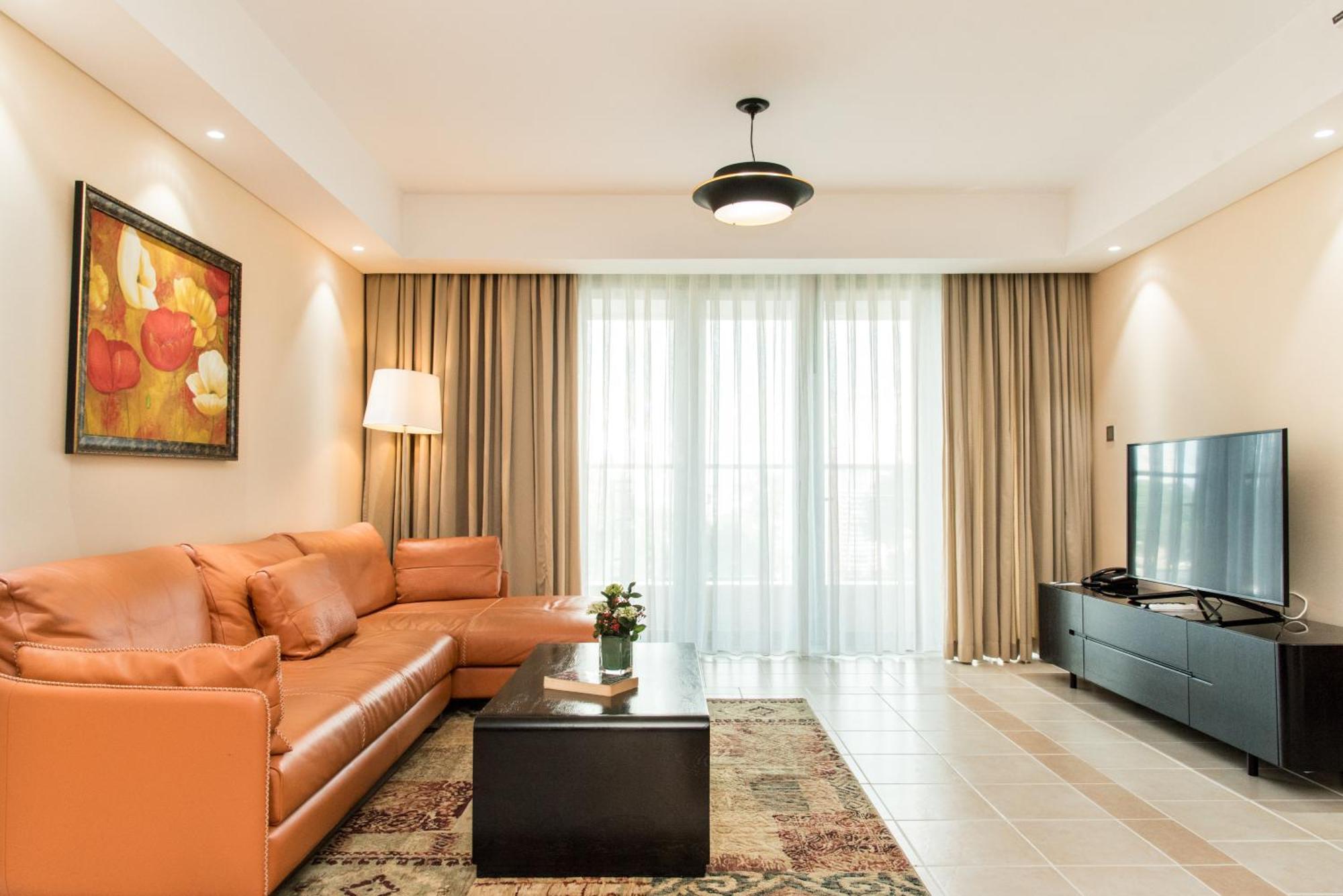 Sherwood Residence Hô Chi Minh-Ville Extérieur photo A living room in a hotel